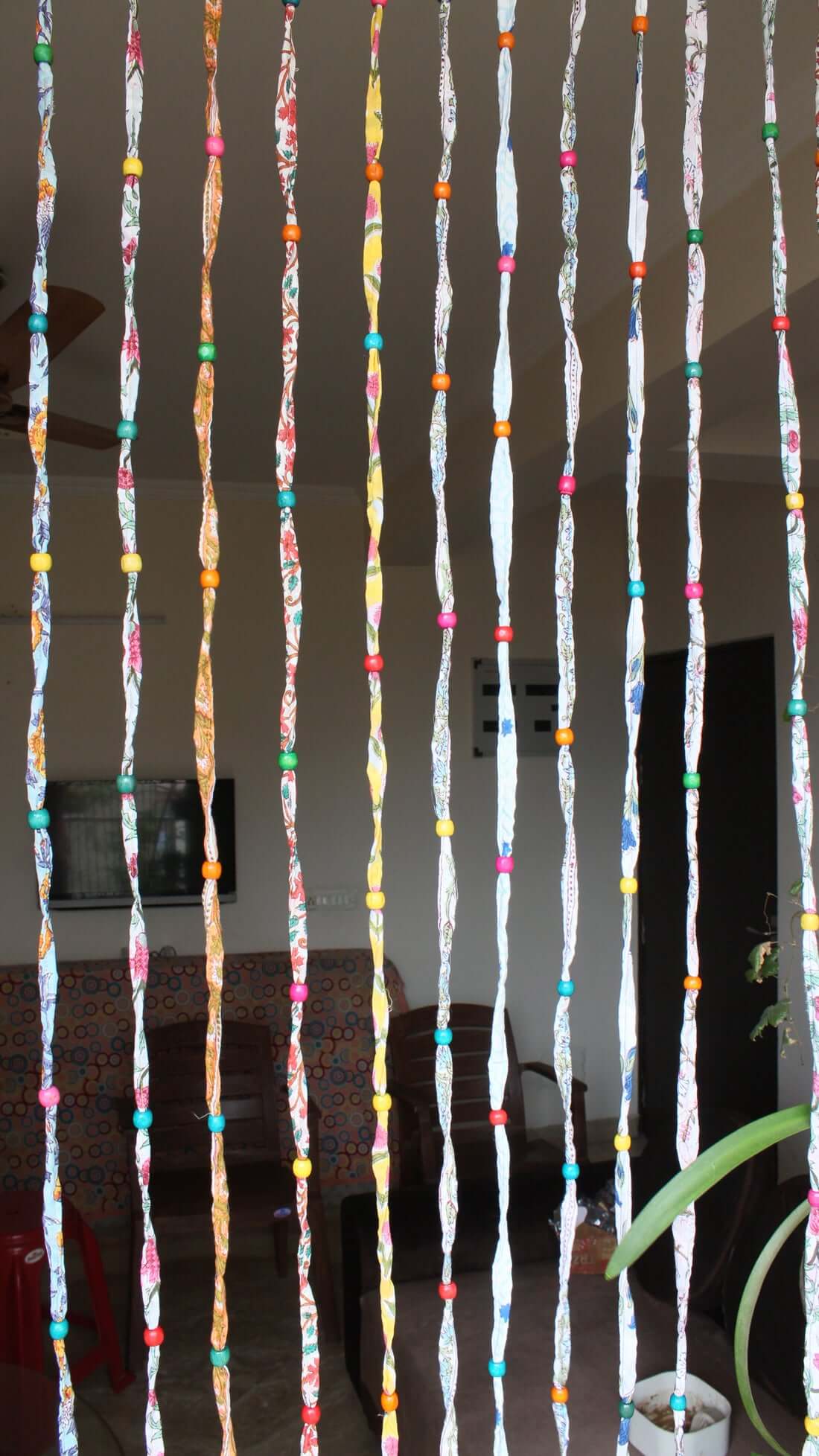 Handmade 100% cotton floral garland curtains, eco-friendly, easy to hang. Perfect for doorways or wall decor. Add a vibrant touch to your home!